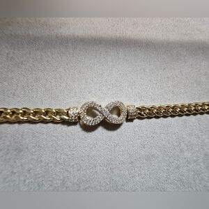 Dazzling Gold Tone Infinity Bracelet with Crystals